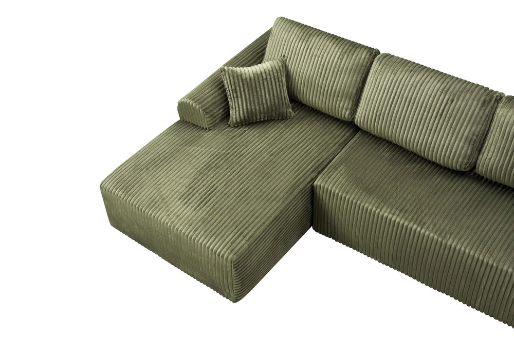 Close-up of the deep chaise and wide-wale green corduroy upholstery