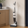 AquaGlide wet dry vacuum stored in its self-cleaning charging dock