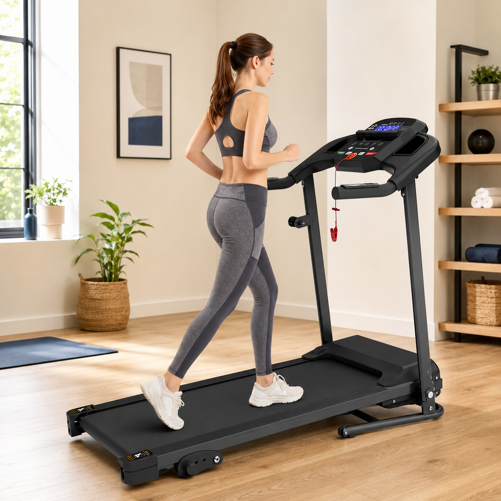 Woman walking on a compact folding treadmill at home