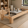 Pilates reformer carriage, shoulder blocks, resistance springs, cords, and pulleys