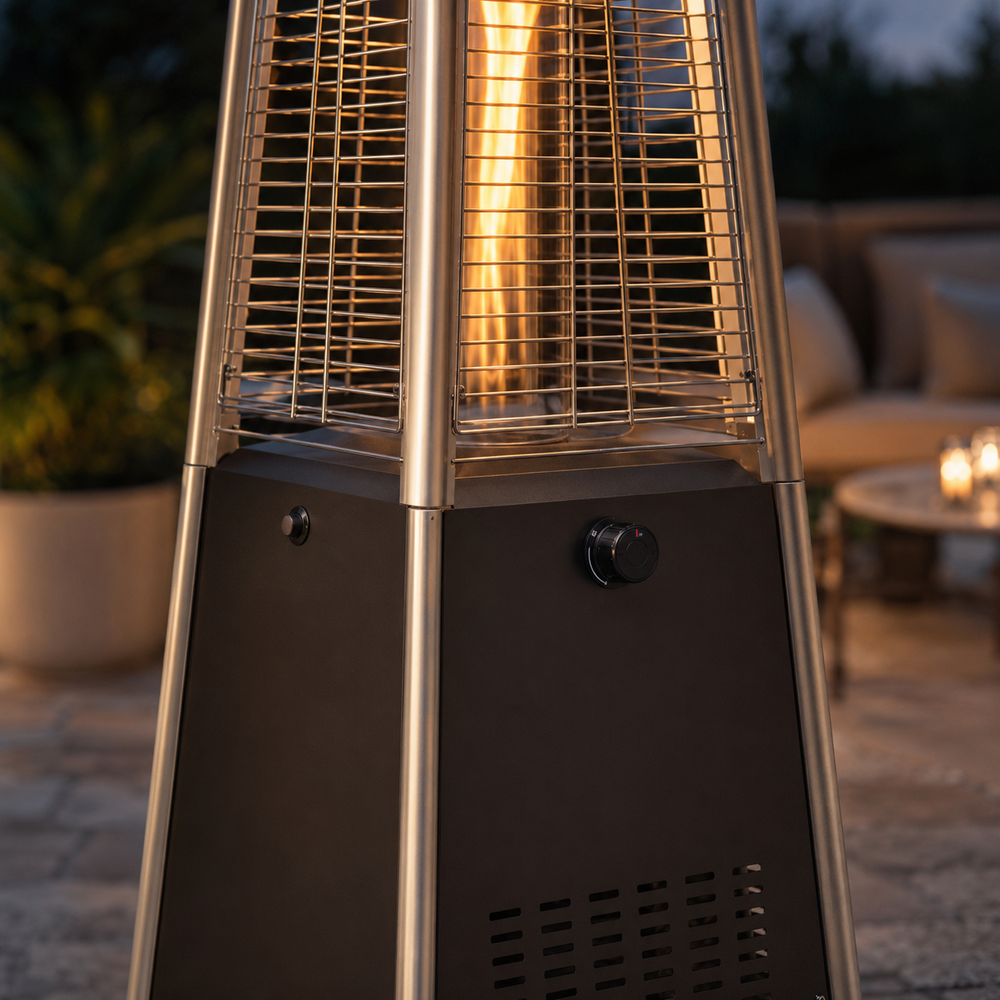 Pulse ignition button and adjustable heat control on a black pyramid patio heater